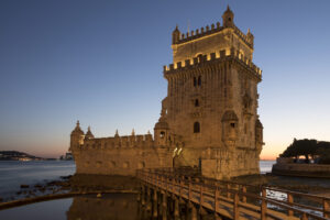 Belem Tower in Lisbon, Portugal ( Torre de Belem or the Tower of St Vincent). It is a UNESCO World Heritage Site because of the significant role it played in the Portuguese maritime discoveries of the era of the Age of Discoveries. The tower was commissioned by King John II to be part of a defence system at the mouth of the Tagus river and a ceremonial gateway to Lisbon.